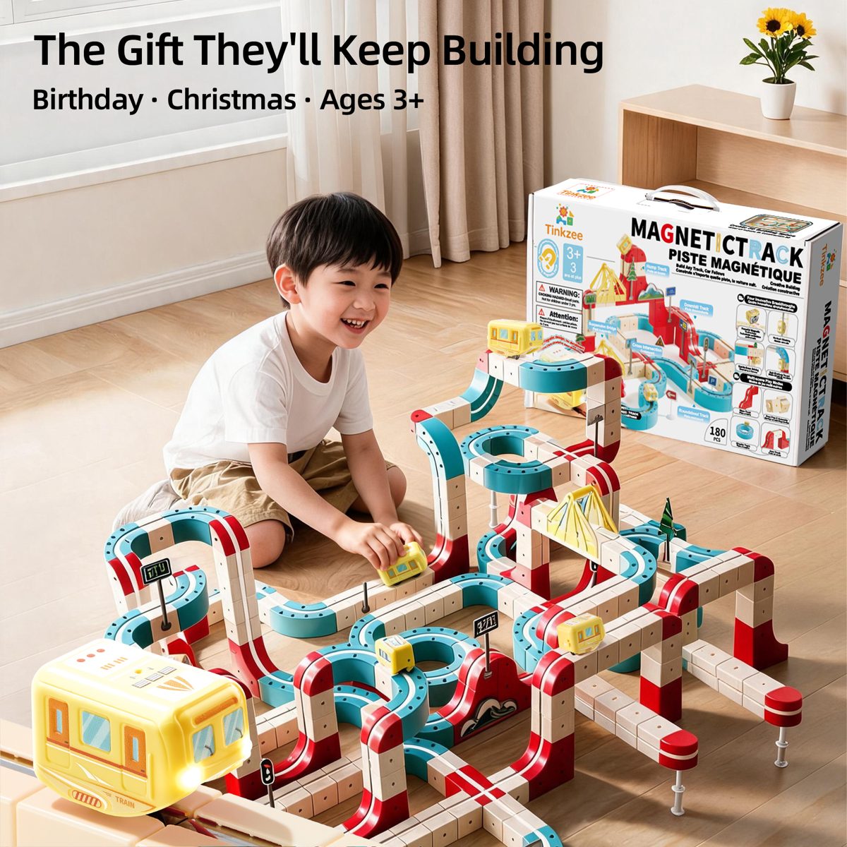 Child playing with the magnetic track gift box